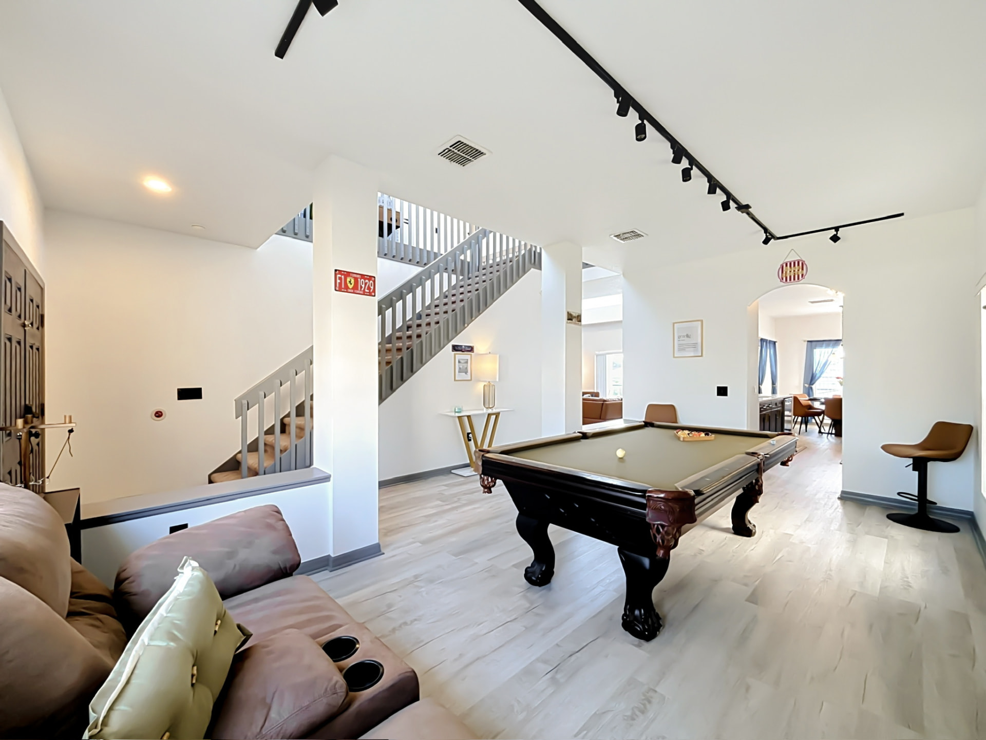 Downstairs game room with pool table