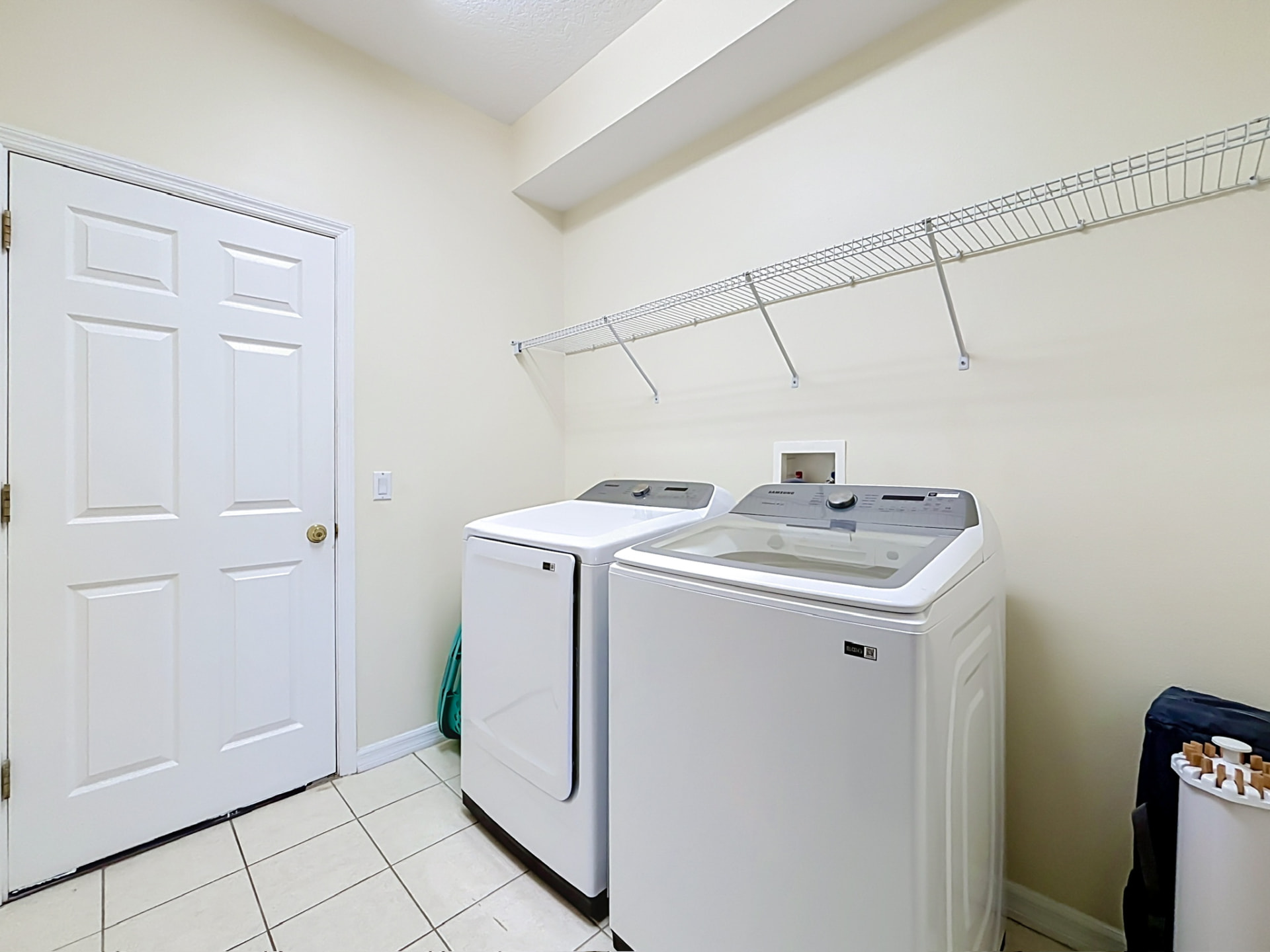 Laundry room with full-size washer and dryer